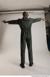 ERIC PILOT STANDING POSE WITH GUNS